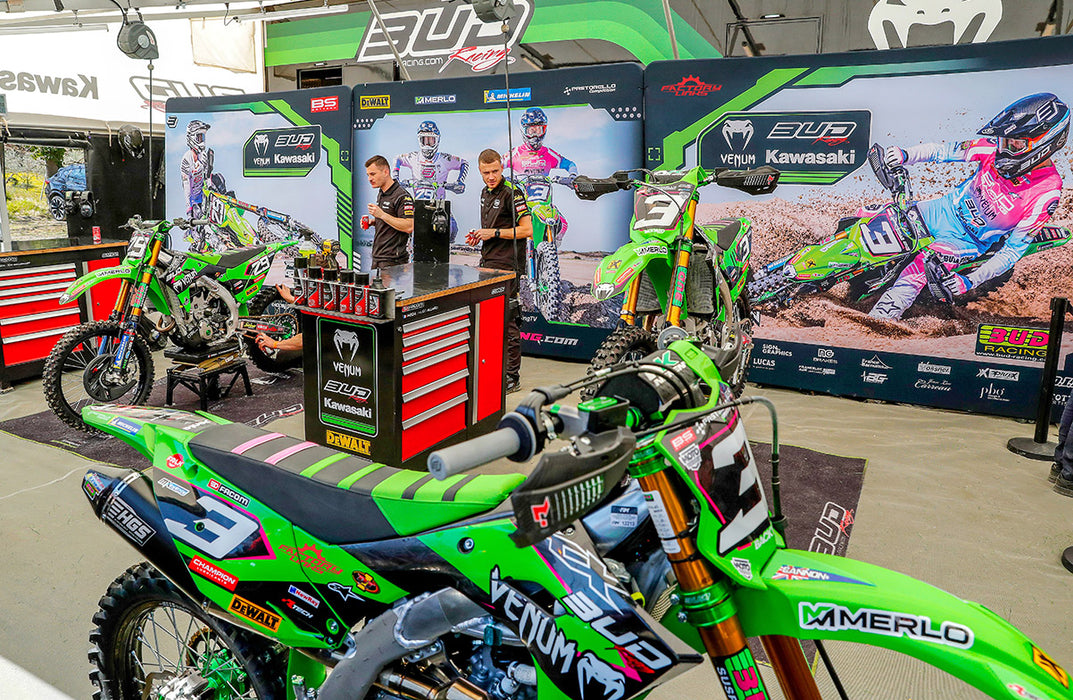 Image showing BUD Racing mechanics working on bikes.